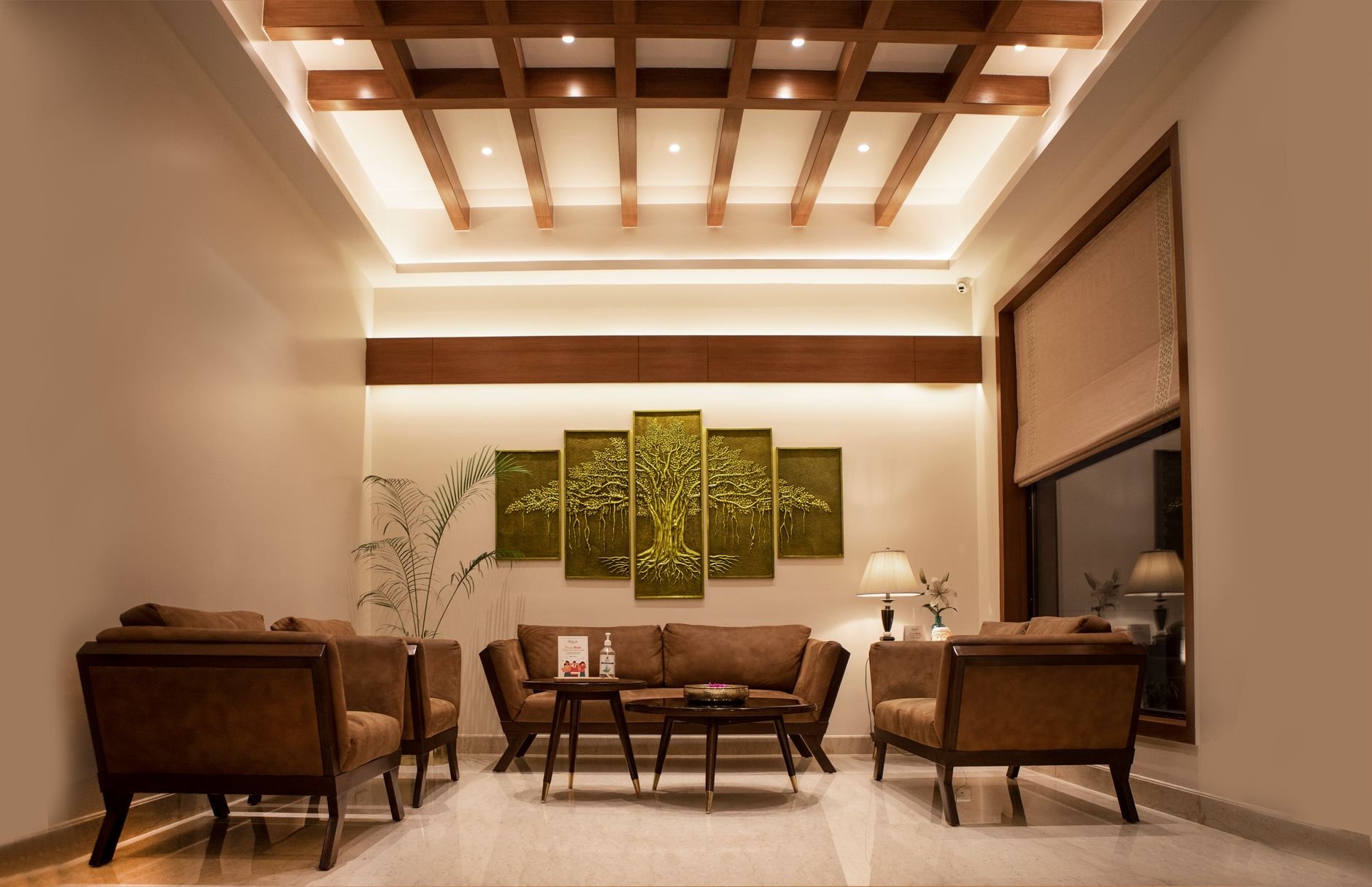 Luxurious living room featuring elegant furniture, artistic decor, and modern interior design.